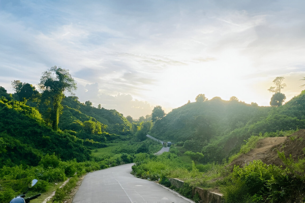 Marine Drive winding through green hills near Cox's Bazar